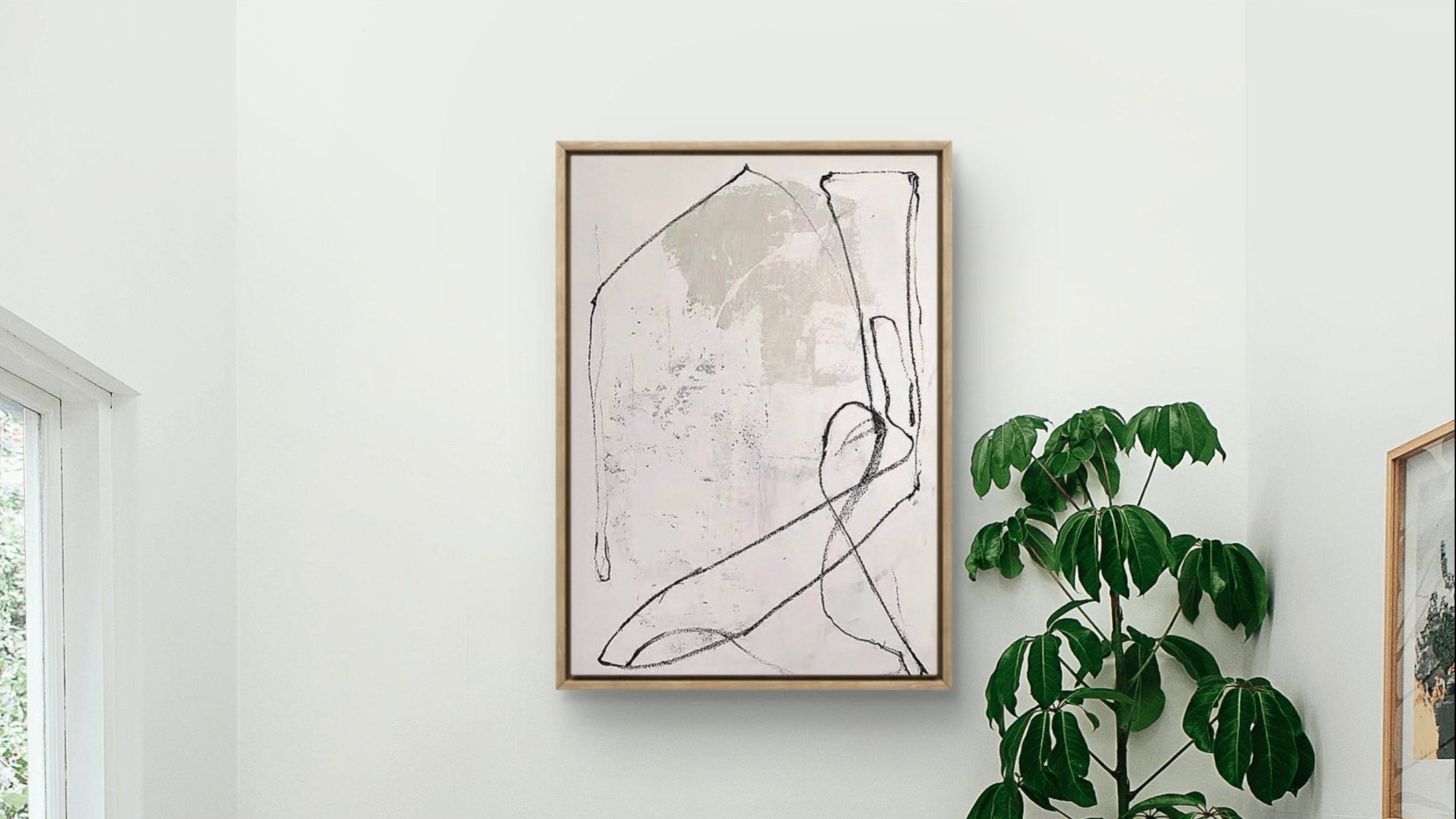 Modern living room with a red armchair or sofa, abstract art, and plants.